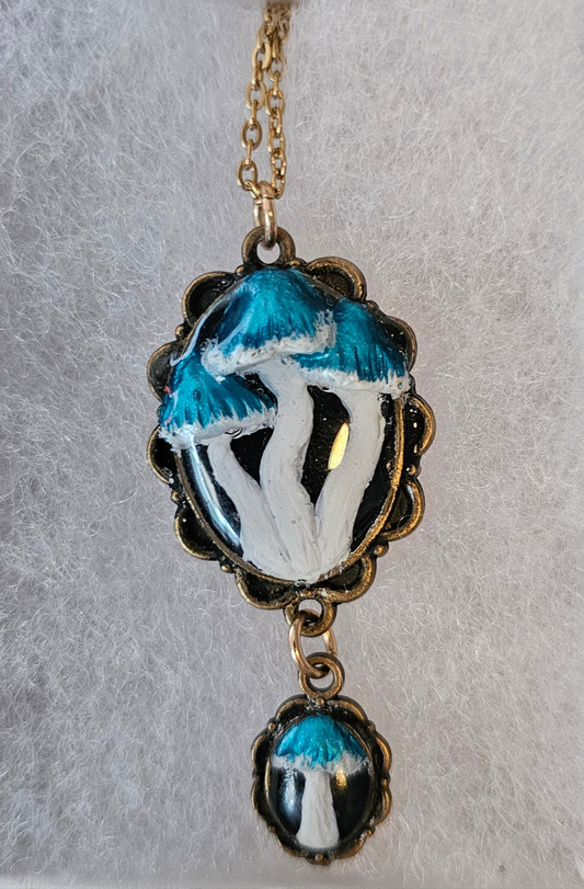 Double Stainless steel Pendant with handcrafted mushrooms, sealed in UV Resin for porcelain look.